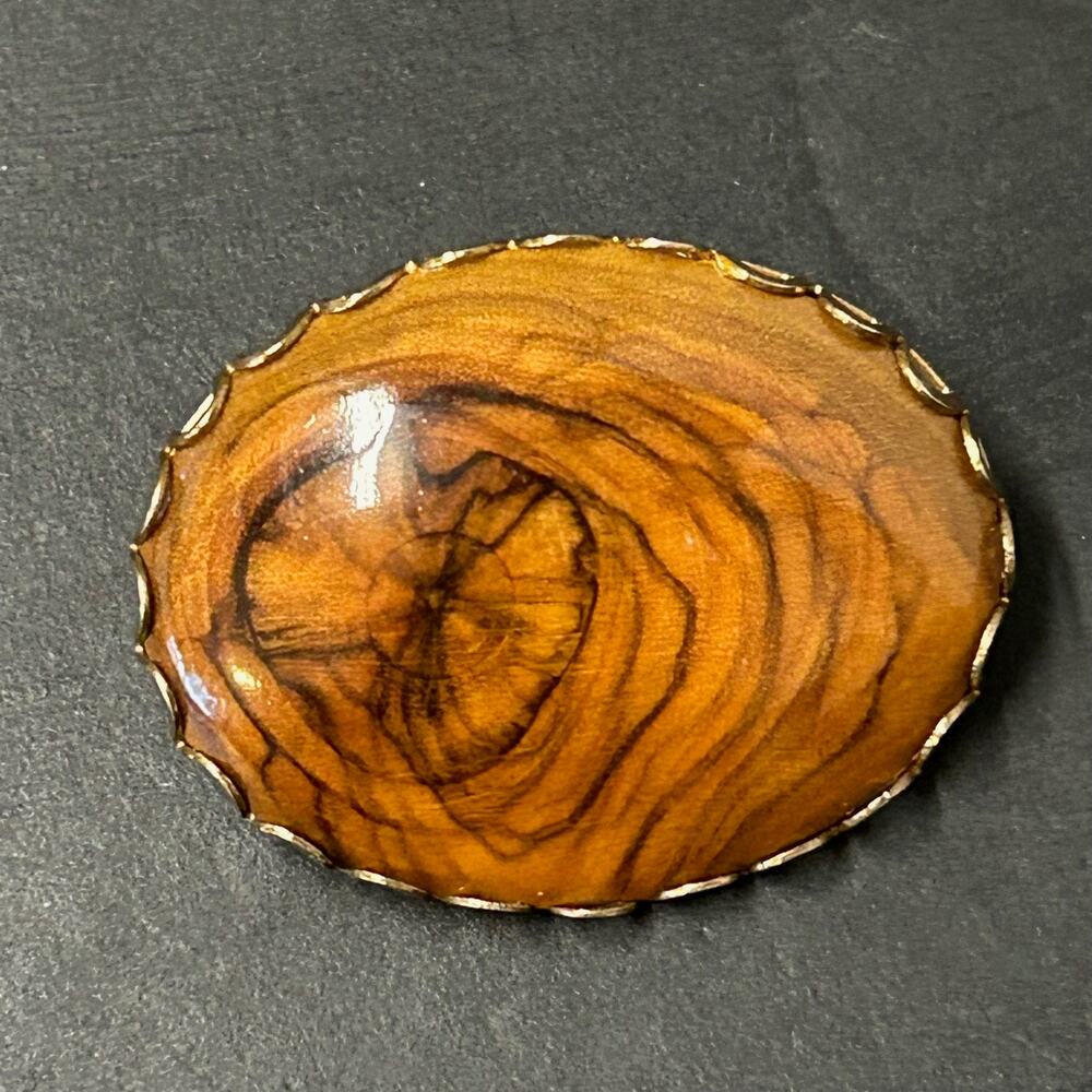 Vintage Highly Polished Wood Brooch Set in Scalloped Open Work Bezel